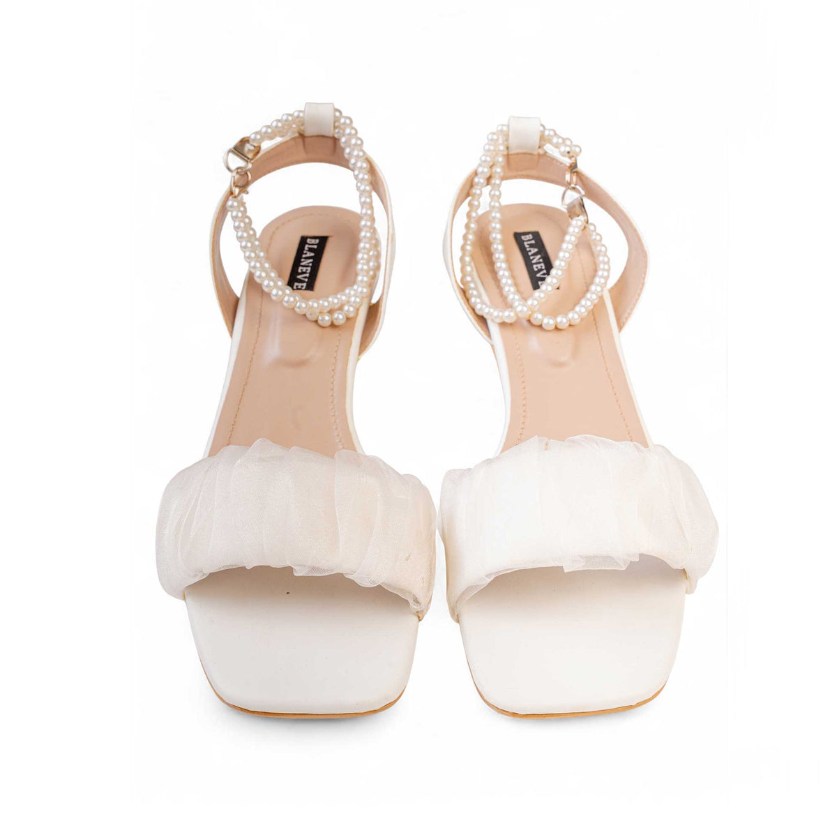Front view of BLANEVE Meringue white sandals with gathered ruffle toe straps and pearl-beaded ankle straps.