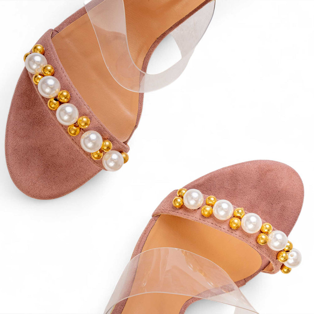 Close-up of oversized pearls and gold-toned beads on the mauve toe straps of BLANEVE Orchid heels.
