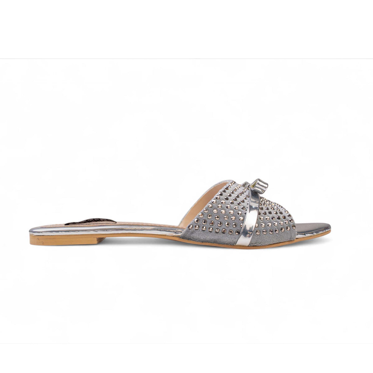 Side view of BLANEVE Starling silver-toned flat slide with a crystal-embellished strap and metallic bow.