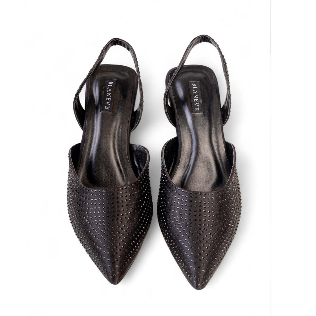 Top view of BLANEVE Noire black slingback heels showing pointed toes and rows of small studs.